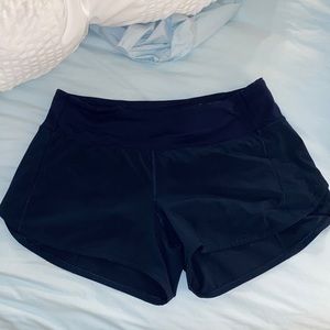 Navy lululemon speed up shorts 4” size 10